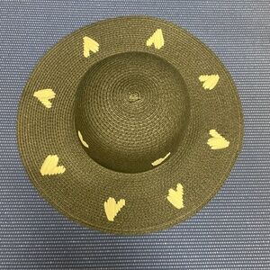 Black straw hat with white hearts